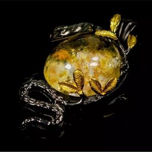 Artisan Snake inspired rutilated quartz pendant